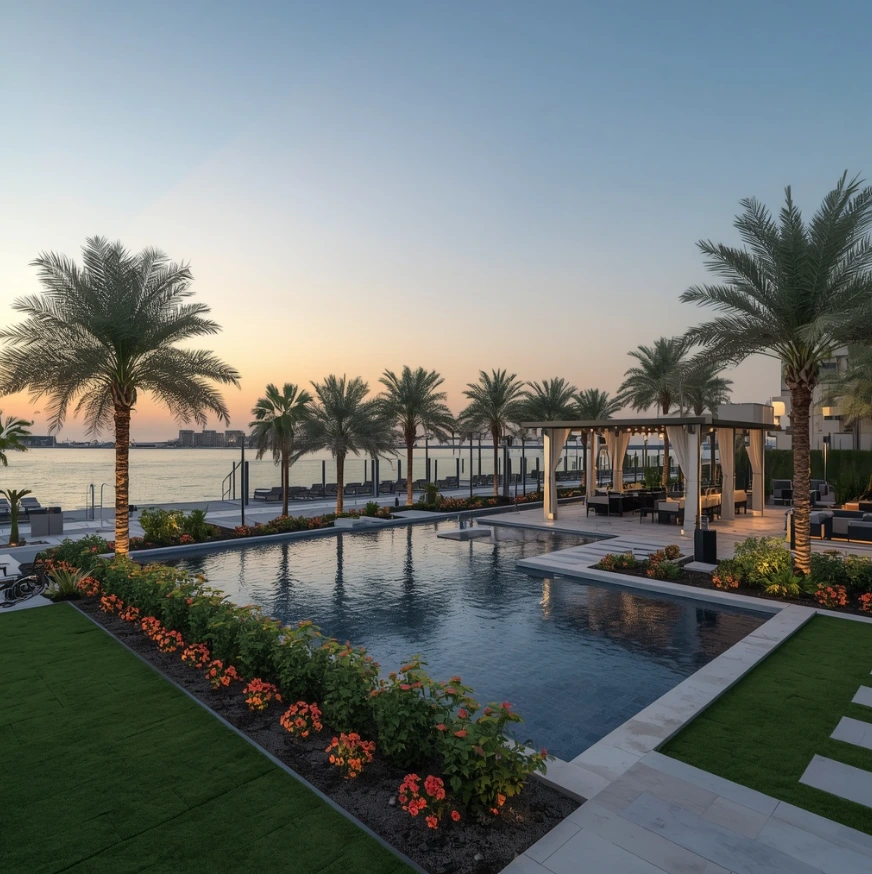 Luxury waterfront landscaping in Corniche Area Abu Dhabi featuring gardens, pools, gazebos, pergolas, lawns, and elegant coastal designs.