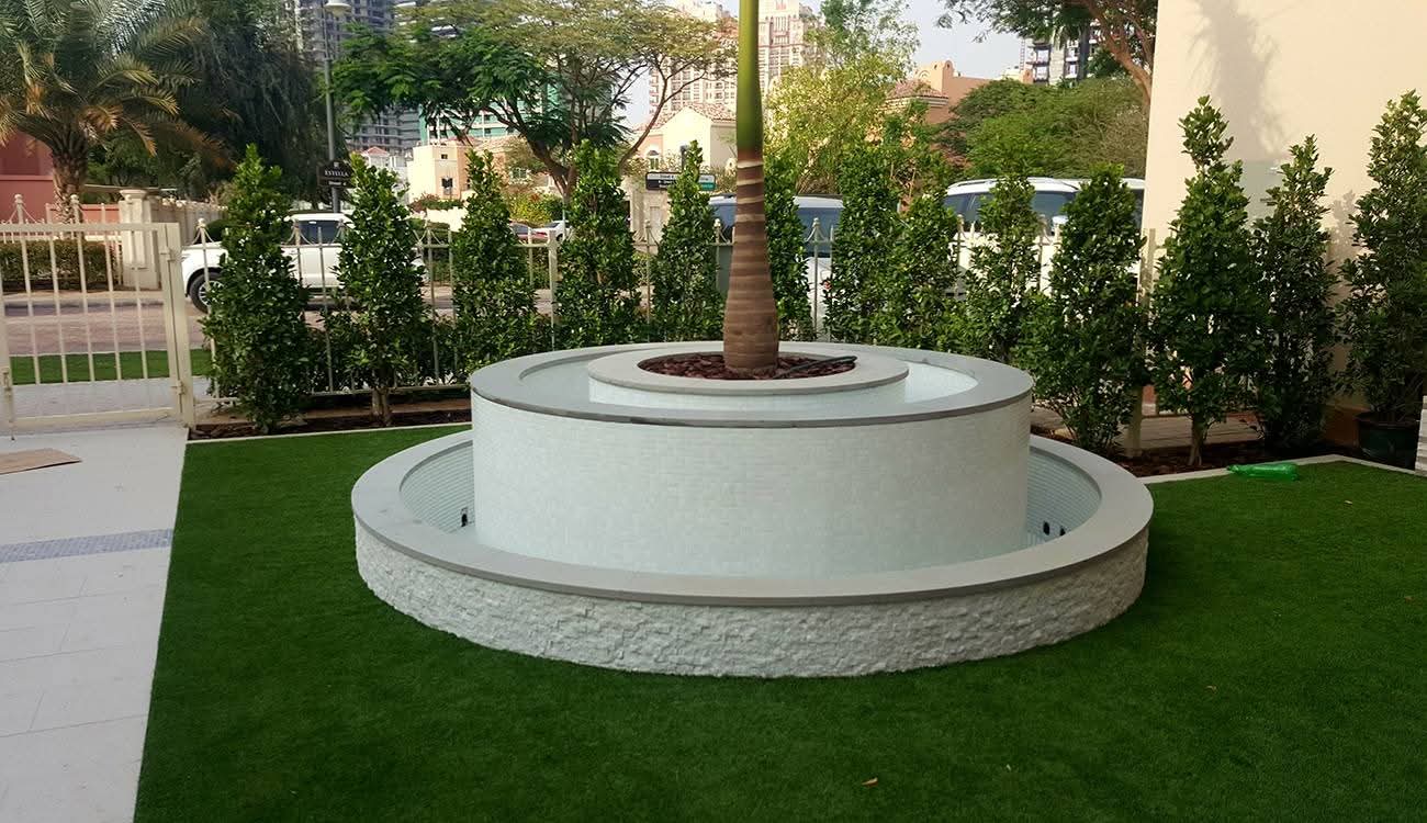 Outdoor landscaping with artificial grass