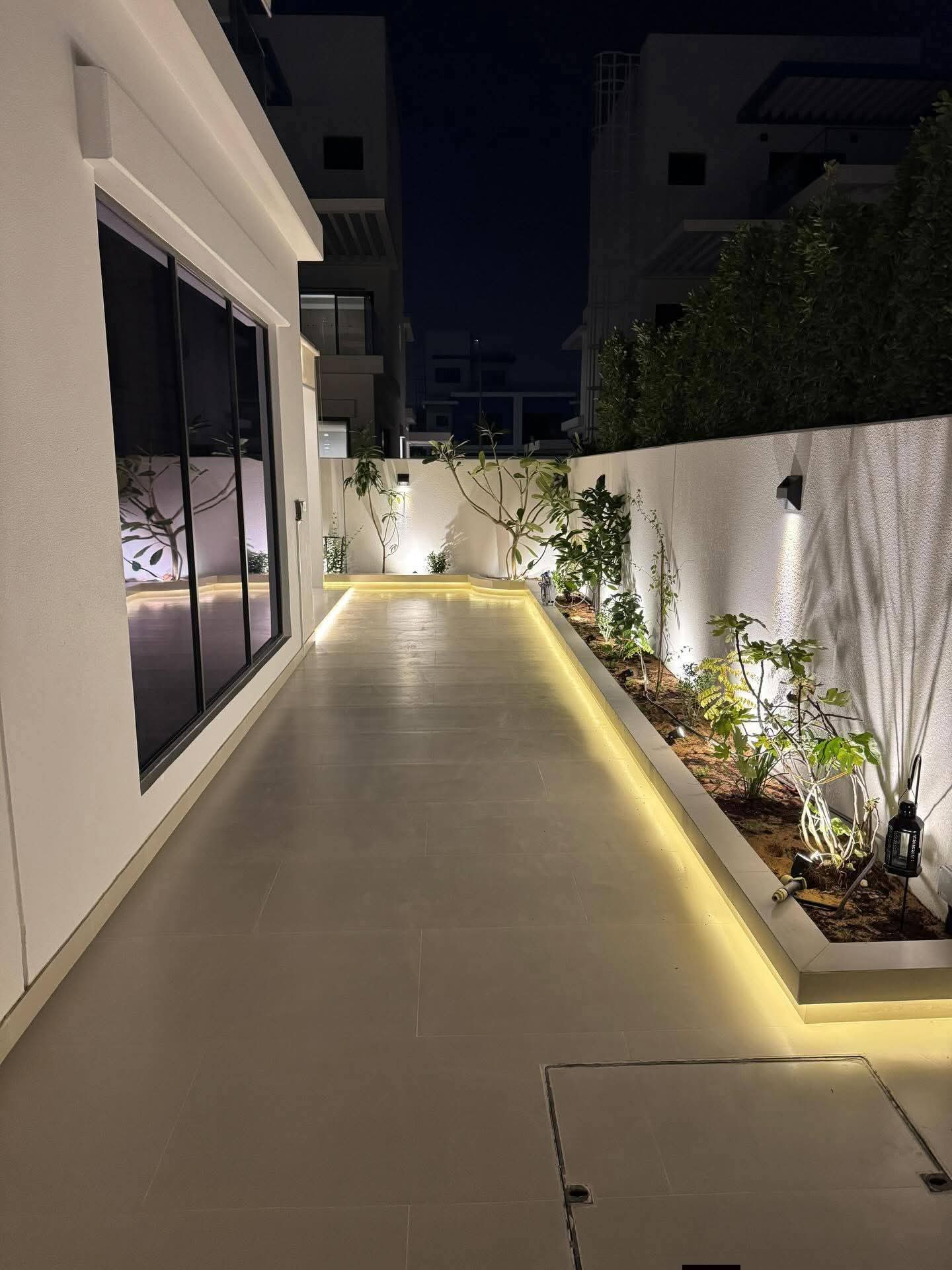 Villa side outdoor area with lighting